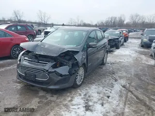 2016 Ford C-Max Hybrid SE with VIN 1FADP5AU4GL100578, listed as a IAAI auction lot 41541249 with 243,956 mi miles. Bid and sale history available at carsss.com. Image 17.