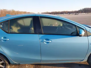 2015 Toyota Prius c One with VIN JTDKDTB37F1086741, listed as a IAAI auction lot 41642663 with 121,313 mi miles. Bid and sale history available at carsss.com. Image 14.