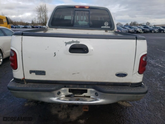 2002 Ford F-150 XLT with VIN 1FTRW07L12KA32310, listed as a Copart auction lot 44012485 with 200,586 mi miles and Salvage Title. Bid and sale history available at carsss.com. Image 6.