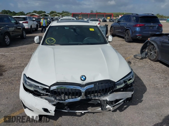 2021 BMW 3 Series 330i with VIN 3MW5R1J00M8B52627, listed as a IAAI auction lot 40722823 with 36,769 mi miles. Bid and sale history available at carsss.com. Image 6.