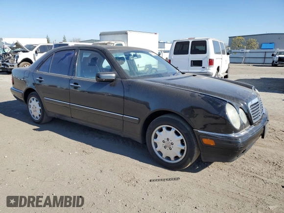 1998 Mercedes-Benz E-Class with VIN WDBJF65F4WA646422, listed as a Copart auction lot 88982785 with 281,524 mi miles and Salvage Title. Bid and sale history available at carsss.com. Image 4.