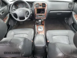 2002 Hyundai Sonata GLS with VIN KMHWF35H52A615774, listed as a Copart auction lot 72336474 with 156,588 mi miles and Salvage Title. Bid and sale history available at carsss.com. Image 8.