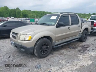 2004 Ford Explorer Sport Trac XLS z VIN 1FMZU67K04UA43558, wystawiony jako IAAI lot #42124644 z przebiegiem 270 550 mil mil oraz . Historia ofert i sprzedaży dostępna na DreamBid. Obrazek 2.