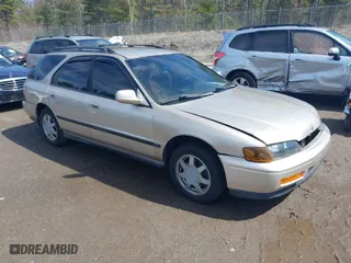 1995 Honda Accord Wgn LX with VIN 1HGCE1827SA012042, listed as a IAAI auction lot 42015855 with 188,428 mi miles. Bid and sale history available at carsss.com. Image 1.