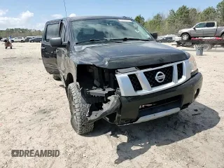 2015 Nissan Titan Pro-4X with VIN 1N6BA0EC1FN507491, listed as a Copart auction lot 51240915 with 165,510 mi miles and Salvage title. Bid and sale history available at DreamBid. Image 11.