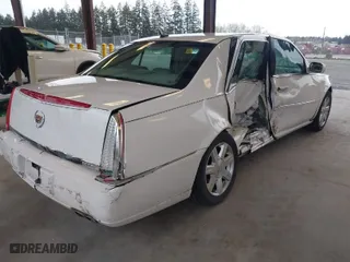 2007 Cadillac DTS Luxury I with VIN 1G6KD57Y87U160493, listed as a IAAI auction lot 41938528 with 162,774 mi miles. Bid and sale history available at carsss.com. Image 4.