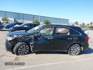 2016 Acura MDX w/Tech/Entertainment with VIN 5FRYD4H64GB045671, listed as a IAAI auction lot 41888947 with 71,084 mi miles. Bid and sale history available at carsss.com. Image 14.
