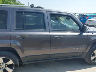 2016 Jeep Patriot Latitude with VIN 1C4NJRFB7GD658594, listed as a IAAI auction lot 42066483 with 146,492 mi miles. Bid and sale history available at carsss.com. Image 13.