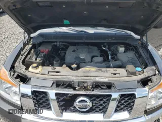 2012 Nissan Titan SV z VIN 1N6AA0EJ9CN325608, wystawiony jako Copart lot #58925565 z przebiegiem 86 967 mil mil oraz Szkoda całkowita • Salvage title. Historia ofert i sprzedaży dostępna na DreamBid. Obrazek 11.