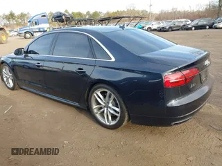 2017 Audi A8 L with VIN WAU44AFDXHN006857, listed as a IAAI auction lot 41758062 with 88,385 mi miles. Bid and sale history available at carsss.com. Image 3.