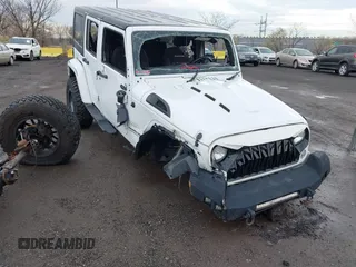2015 Jeep Wrangler Unlimited Sahara with VIN 1C4BJWEG5FL518191, listed as a IAAI auction lot 41914581 with 107,433 mi miles. Bid and sale history available at carsss.com. Image 6.