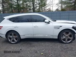 2023 Genesis GV80 z VIN KMUHBDSB8PU140123, wystawiony jako IAAI lot #41692036 z przebiegiem 37 021 mil mil oraz . Historia ofert i sprzedaży dostępna na DreamBid. Obrazek 14.