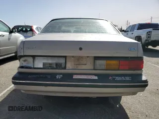 1989 Ford Tempo z VIN 1FAPP31X0KK113919, wystawiony jako Copart lot #76599314 z przebiegiem 65 823 mil mil oraz Tytuł czysty. Historia ofert i sprzedaży dostępna na DreamBid. Obrazek 6.