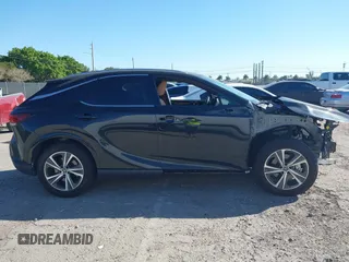 2024 Lexus RX with VIN JTJCHMAA3R2018477, listed as a IAAI auction lot 41738156 with 7,480 mi miles. Bid and sale history available at carsss.com. Image 14.