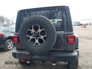 2018 Jeep Wrangler Unlimited Rubicon with VIN 1C4HJXFG8JW111195, listed as a IAAI auction lot 41916718 with 190,158 mi miles and . Bid and sale history available at DreamBid. Image 16.