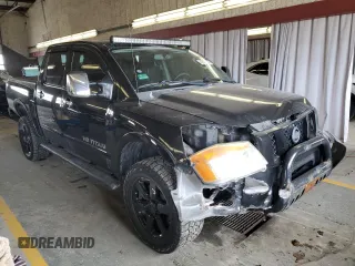 2011 Nissan Titan Pro-4X with VIN 1N6AA0EC5BN307980, listed as a Copart auction lot 42000295 with 168,335 mi miles and Salvage title. Bid and sale history available at DreamBid. Image 4.