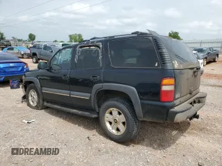 2002 Chevrolet Tahoe LT with VIN 1GNEC13Z52R303777, listed as a Copart auction lot 54942055 with 291,043 mi miles and Salvage title. Bid and sale history available at DreamBid. Image 2.