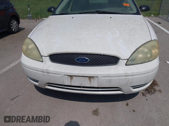 2005 Ford Taurus SE with VIN 1FAFP53255A304254, listed as a IAAI auction lot 42647002 with Not provided miles and . Bid and sale history available at DreamBid. Image 6.