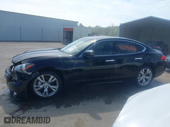 2013 Infiniti M with VIN JN1AY1AR6DM590187, listed as a IAAI auction lot 42096806 with 182,909 mi miles and . Bid and sale history available at DreamBid. Image 14.
