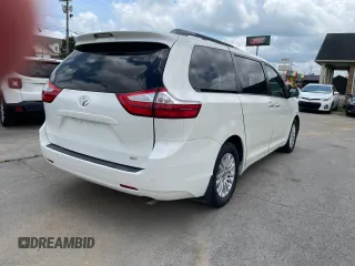 2016 Toyota Sienna XLE with VIN 5TDYK3DC3GS761177, listed as a Copart auction lot 61506935 with 134,732 mi miles and Clean title. Bid and sale history available at DreamBid. Image 4.