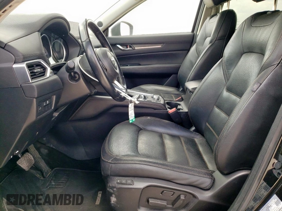 2018 Mazda CX-5 Grand Touring with VIN JM3KFBDM6J0414523, listed as a Copart auction lot 57581145 with 69,353 mi miles and Salvage title. Bid and sale history available at DreamBid. Image 7.