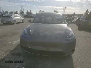 2022 Tesla Model Y Performance with VIN 7SAYGDEF3NF490643, listed as a Copart auction lot 46975825 with 50,792 mi miles and Salvage Title. Bid and sale history available at DreamBid. Image 11.