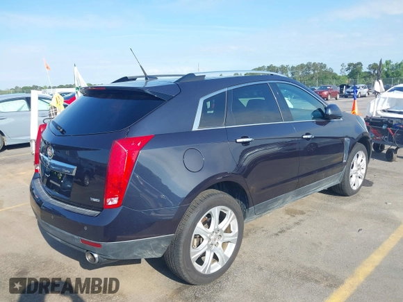 2014 Cadillac SRX Performance Collection with VIN 3GYFNCE39ES613051, listed as a IAAI auction lot 42113063 with 82,952 mi miles and . Bid and sale history available at carsss.com. Image 4.