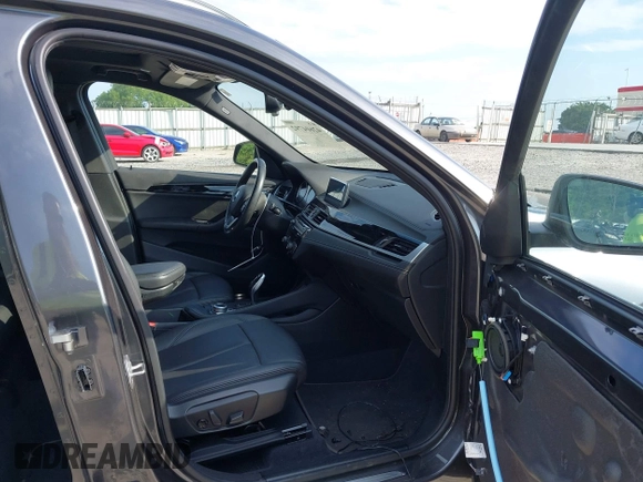 2020 BMW X1 xDrive28i with VIN WBXJG9C08L5R71788, listed as a IAAI auction lot 42604792 with 46,489 mi miles and . Bid and sale history available at DreamBid. Image 5.