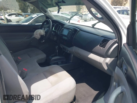2014 Toyota Tacoma with VIN 5TFNX4CN0EX040545, listed as a IAAI auction lot 42159053 with 66,629 mi miles and . Bid and sale history available at DreamBid. Image 5.
