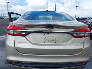 2017 Ford Fusion Hybrid SE with VIN 3FA6P0LU0HR355269, listed as a IAAI auction lot 41745299 with 97,675 mi miles and . Bid and sale history available at DreamBid. Image 6.