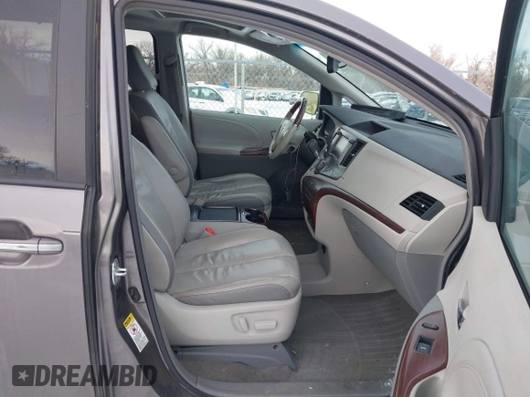2011 Toyota Sienna XLE AAS with VIN 5TDYK3DC5BS138281, listed as a IAAI auction lot 41381494 with 194,635 mi miles and . Bid and sale history available at DreamBid. Image 5.
