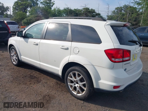 2012 Dodge Journey SXT with VIN 3C4PDCBG0CT206649, listed as a IAAI auction lot 42853311 with 146,686 mi miles and . Bid and sale history available at DreamBid. Image 3.