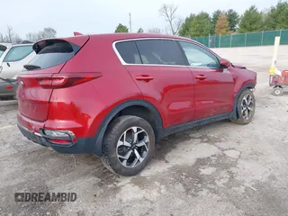 2020 Kia Sportage LX z VIN KNDPMCAC0L7697209, wystawiony jako IAAI lot #41795208 z przebiegiem 129 188 mil mil oraz . Historia ofert i sprzedaży dostępna na DreamBid. Obrazek 4.