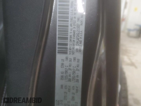 2016 Jeep Wrangler Unlimited Rubicon z VIN 1C4HJWFGXGL211657, wystawiony jako Copart lot #45135355 z przebiegiem 97 046 mil mil oraz Szkoda całkowita • Salvage title. Historia ofert i sprzedaży dostępna na DreamBid. Obrazek 13.