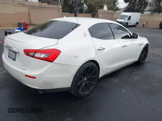 2014 Maserati Ghibli S Q4 with VIN ZAM57RTA3E1090350, listed as a IAAI auction lot 42056682 with 119,160 mi miles and . Bid and sale history available at DreamBid. Image 4.