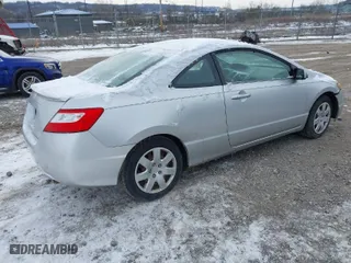 2007 Honda Civic Cpe LX with VIN 2HGFG12627H505932, listed as a IAAI auction lot 41609140 with 188,438 mi miles. Bid and sale history available at carsss.com. Image 4.