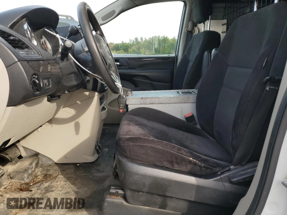 2014 Ram Cargo Van Tradesman with VIN 2C4JRGAG0ER389962, listed as a Copart auction lot 74565654 with 192,137 mi miles and Salvage Title. Bid and sale history available at carsss.com. Image 7.