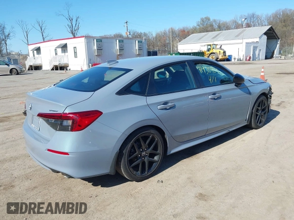 2022 Honda Civic Sport z VIN 2HGFE2F55NH551068, wystawiony jako IAAI lot #41936465 z przebiegiem 26 665 mil mil oraz . Historia ofert i sprzedaży dostępna na DreamBid. Obrazek 4.