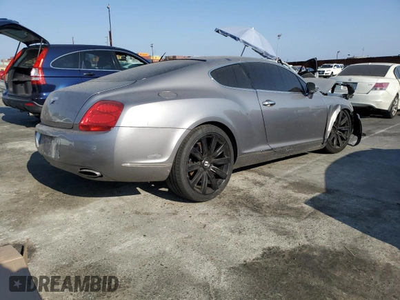 2007 Bentley Continental GT с VIN SCBCR73W77C049977, выставлен на аукционе Copart как лот 62533184 с пробегом Не указан миль и Списание • Salvage title. История ставок и продаж доступна на DreamBid. Изображение 3.