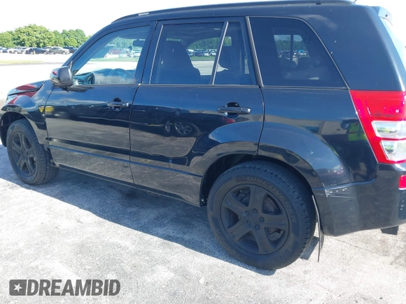 2006 Suzuki Grand Vitara Luxury z VIN JS3TD947664104590, wystawiony jako IAAI lot #42798282 z przebiegiem 146 725 mil mil oraz . Historia ofert i sprzedaży dostępna na DreamBid. Obrazek 6.