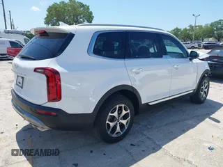 2022 Kia Telluride EX z VIN 5XYP34HC4NG319365, wystawiony jako IAAI lot #41910029 z przebiegiem 27 338 mil mil oraz . Historia ofert i sprzedaży dostępna na DreamBid. Obrazek 4.