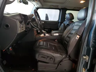 2005 Hummer H2 SUV z VIN 5GRGN23U65H127711, wystawiony jako Copart lot #53180865 z przebiegiem 178 085 mil mil oraz Szkody całkowita. Historia ofert i sprzedaży dostępna na DreamBid. Obrazek 7.