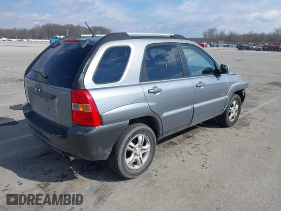 2005 Kia Sportage LX with VIN KNDJE723757102304, listed as a IAAI auction lot 41689073 with 125,276 mi miles and . Bid and sale history available at carsss.com. Image 4.