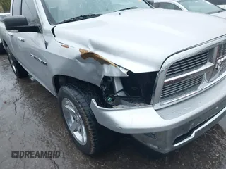 2012 Ram 1500 Big Horn z VIN 1C6RD6GT3CS224300, wystawiony jako IAAI lot #40807733 z przebiegiem 145 495 mil mil oraz . Historia ofert i sprzedaży dostępna na DreamBid. Obrazek 6.