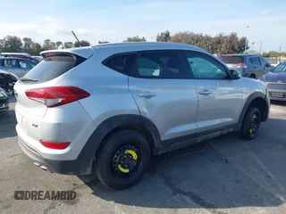 2016 Hyundai Tucson Sport with VIN KM8J33A20GU165154, listed as a IAAI auction lot 41611785 with Not Provided miles. Bid and sale history available at carsss.com. Image 12.