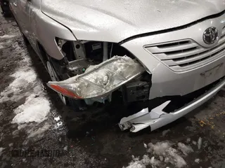 2009 Toyota Camry z VIN 4T1BE46KX9U352465, wystawiony jako IAAI lot #41518299 z przebiegiem 107 348 mil mil oraz . Historia ofert i sprzedaży dostępna na DreamBid. Obrazek 6.