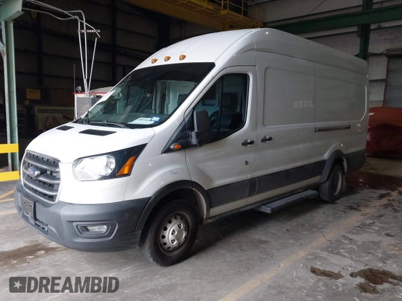 2020 Ford Transit Cargo with VIN 1FTBF4XG0LKB31391, listed as a IAAI auction lot 41603637 with 87,279 mi miles and . Bid and sale history available at DreamBid. Image 2.
