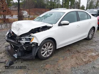 2013 Volkswagen Jetta SE with VIN 3VWDX7AJ2DM384537, listed as a IAAI auction lot 41548219 with 86,172 mi miles and . Bid and sale history available at DreamBid. Image 2.