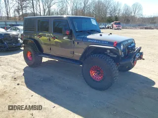 2018 Jeep Wrangler Unlimited Rubicon Recon with VIN 1C4BJWFG3JL887459, listed as a IAAI auction lot 41687698 with 97,031 mi miles and . Bid and sale history available at DreamBid. Image 1.