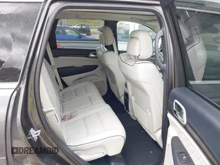2020 Jeep Grand Cherokee Summit with VIN 1C4RJFJT2LC408499, listed as a IAAI auction lot 41854021 with 78,189 mi miles and . Bid and sale history available at DreamBid. Image 8.